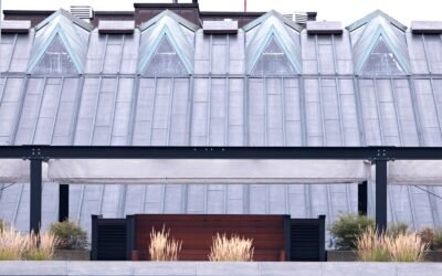 a tall building with a clock on the front of it