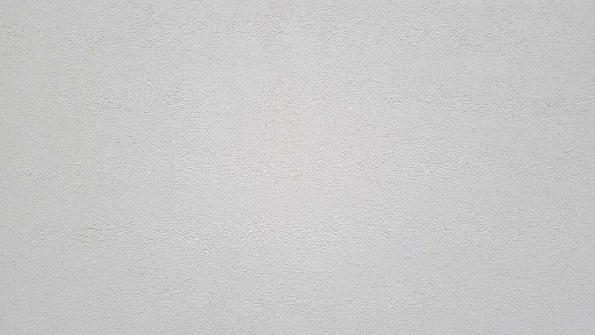 Un plan de couleur claire avec texture légèrement granuleuse